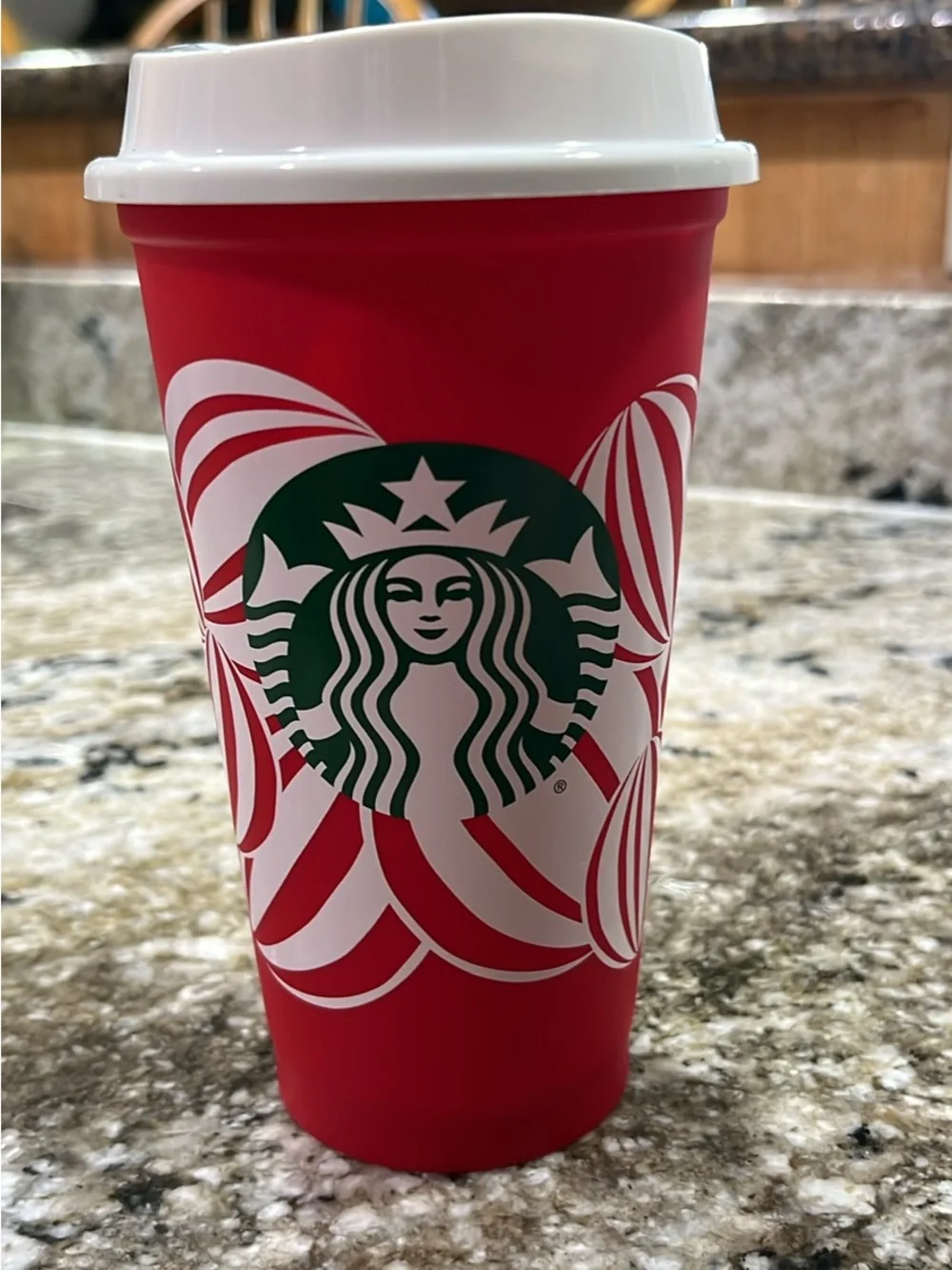 Starbucks Red Cup with Green Logo and White Lid